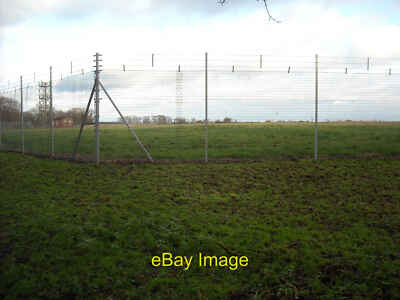 Photo 6x4 Boundary fence RAF Lyneham airfield RAF Lyneham closed on 31st  c2014