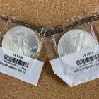 Lot of 2 American Eagle Uncirculated Coins, Walking Liberty 2002 and 2004