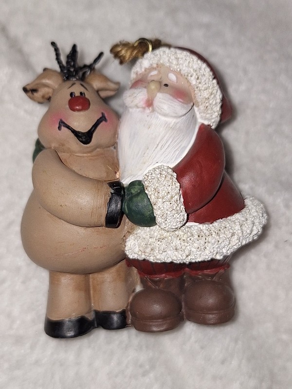 Santa Figurine Hugging  Rudolph The Red Nosed Reindeer ,ornament 