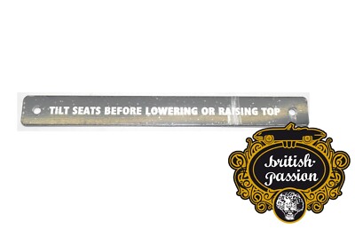 Schild ''TILT SEATS BEFORE LOWERING OR RAISING TOP'' Jaguar E-Type