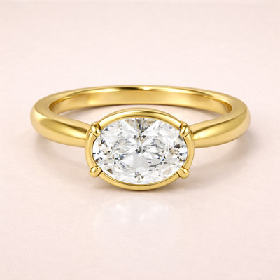Oval Bezel Set Lab Grown Diamond Solitaire Ring in Yellow Gold Minimal Modern