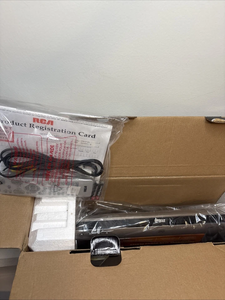 Reproductor de DVD-R/-RW/CD-R/-RW/-RW/MP3 RCA DRC212N, nuevo en caja abierta Foto 2 de 4