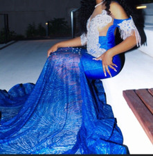 I  m selling my blue and silver prom dress for 800. Worn for 2 hours.