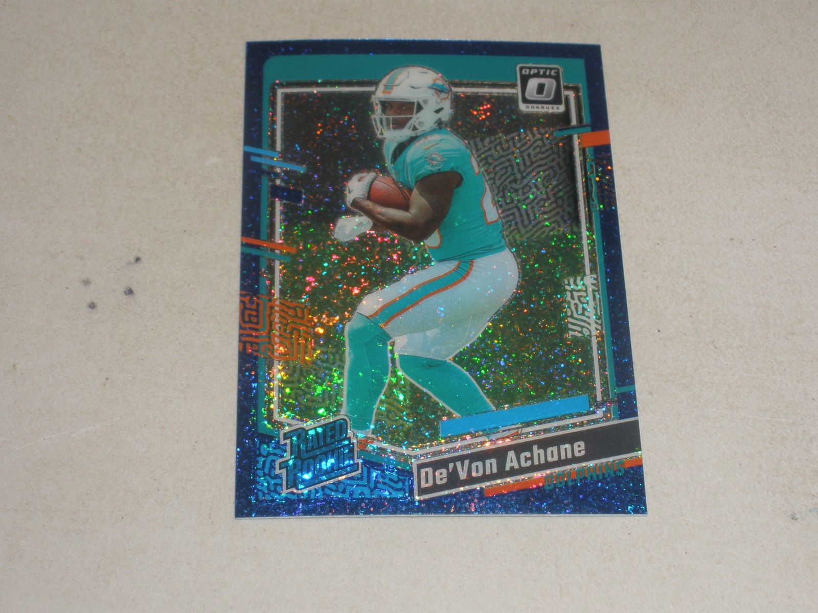 2023 Donruss Optic Rated Rookie Blue Glitter Prizm #269 De'Von Achane RC