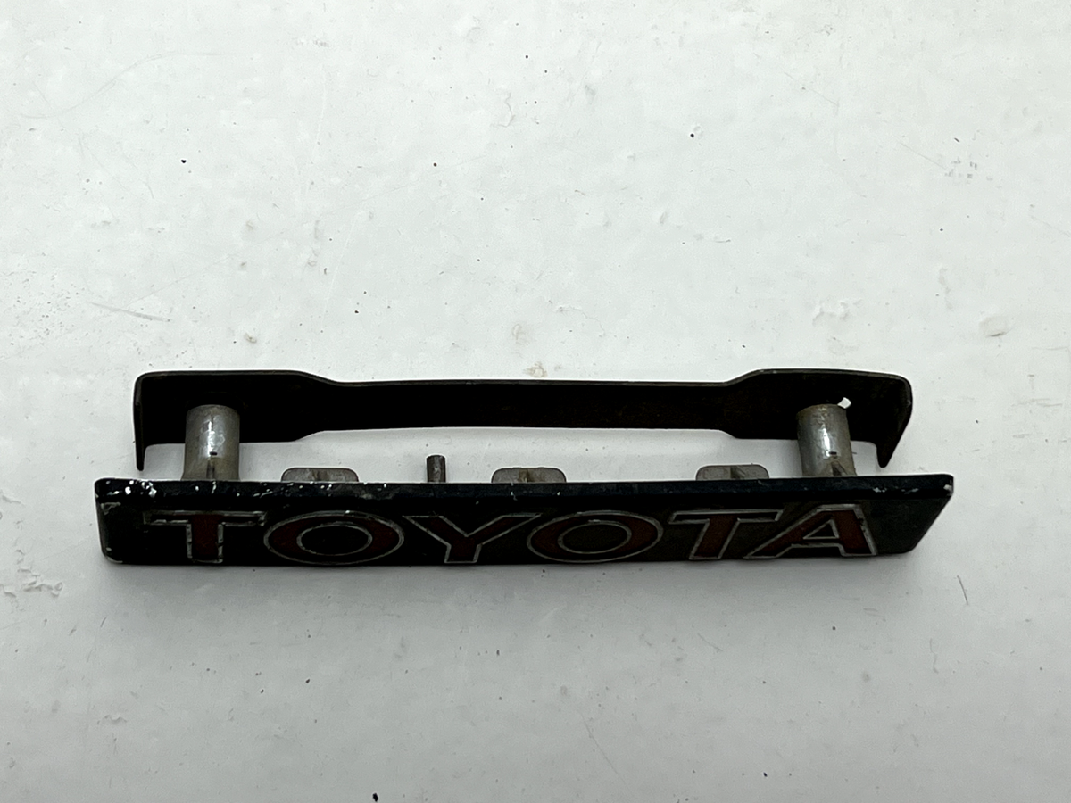 1975-1980 Toyota Corolla Grill Emblem Trim Molding 75311-12570 for