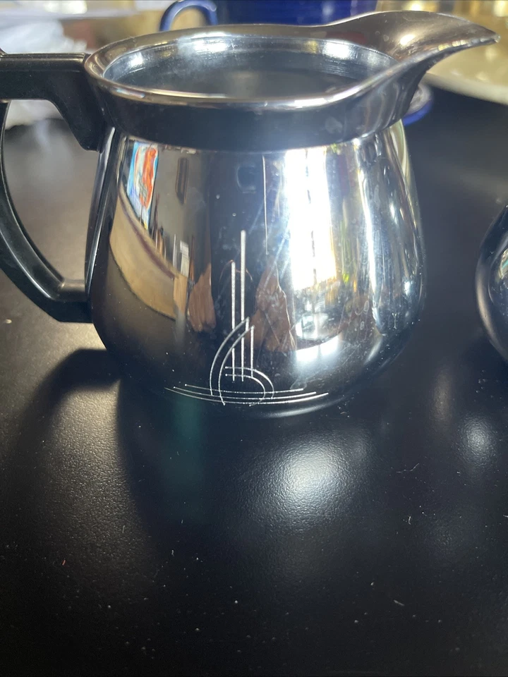 Juego de crema y azucarero de acero inoxidable Stelton con tapa Foto 2 de 3