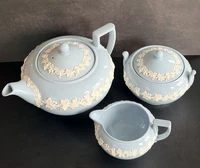 Wedgwood Of Etruria and Barlaston Embossed Queens Ware Tea Pot, creamer and sugar
