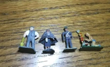 Lot Of 4 HO Scale Metal People, Woman cooking on grill,policeman,workman,lady