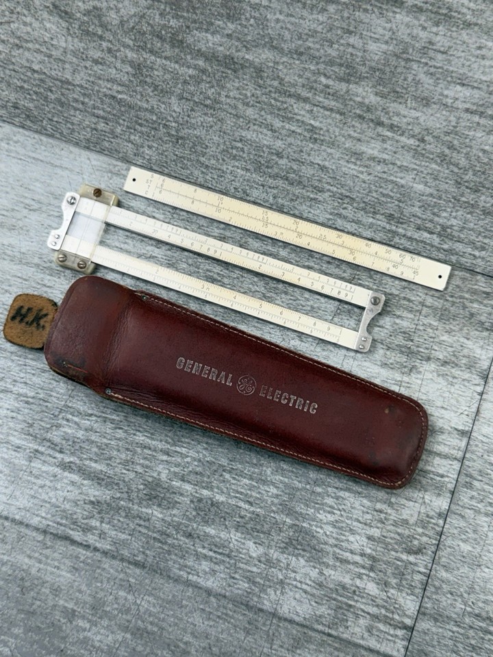 A 6" Pickett slide rule issued to General Electric engineers — a genuine piece of American industrial history that fits in your pocket and predates every calculator on earth.