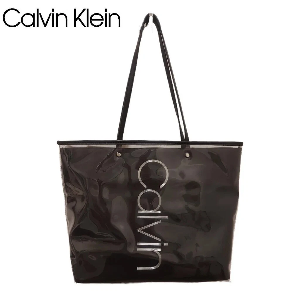 Calvin klein clear logo bag deals