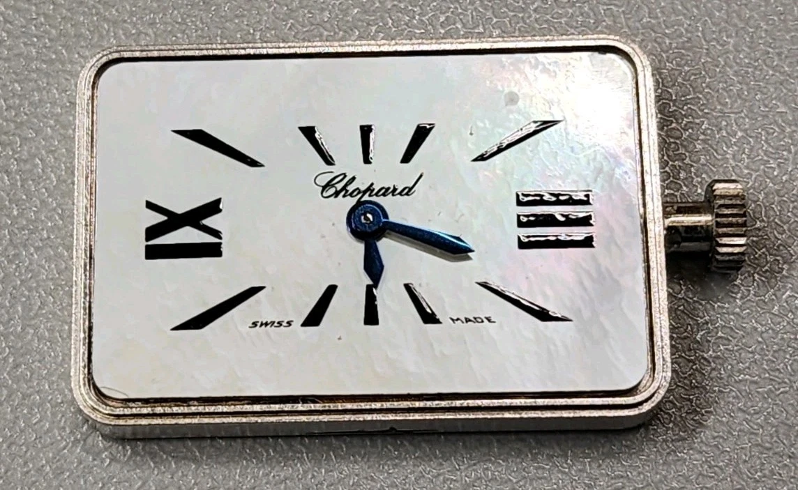 Chopard — CHOPARD  WHITE MOP DIAL CAL 976.001 QUARTZ WATCH MOVEMENT