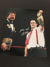 I.R.S.  (MIKE ROTUNDA) AUTOGRAPHED 8 X 10 PHOTO W/ MILLION DOLLAR MAN