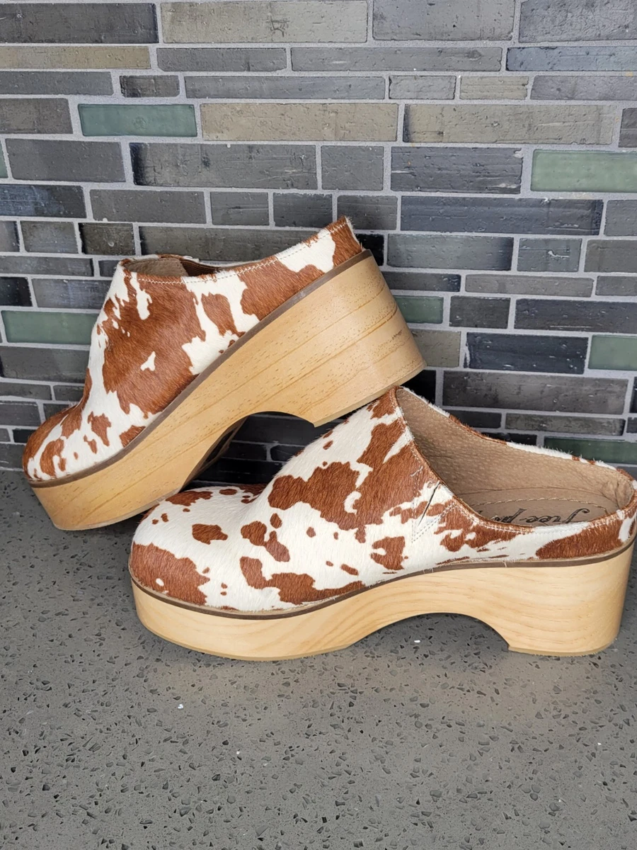Cow print best sale clogs