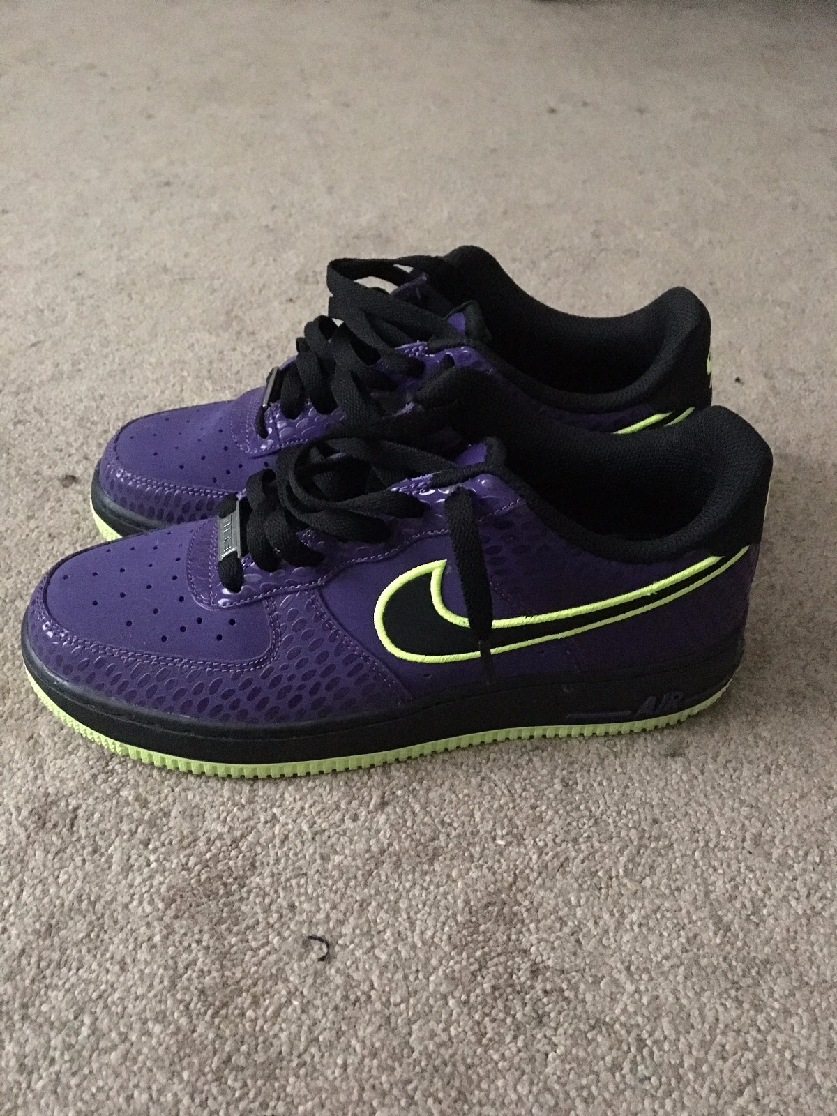 purple and lime green sneakers