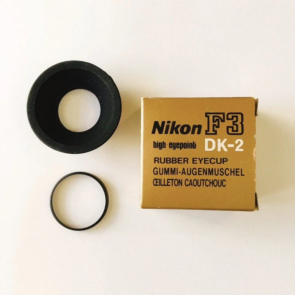 Ocular de goma Nikon DK-2 para punto de vista alto F3T F5 F4 F4s manuales en inglés Foto 2 de 4