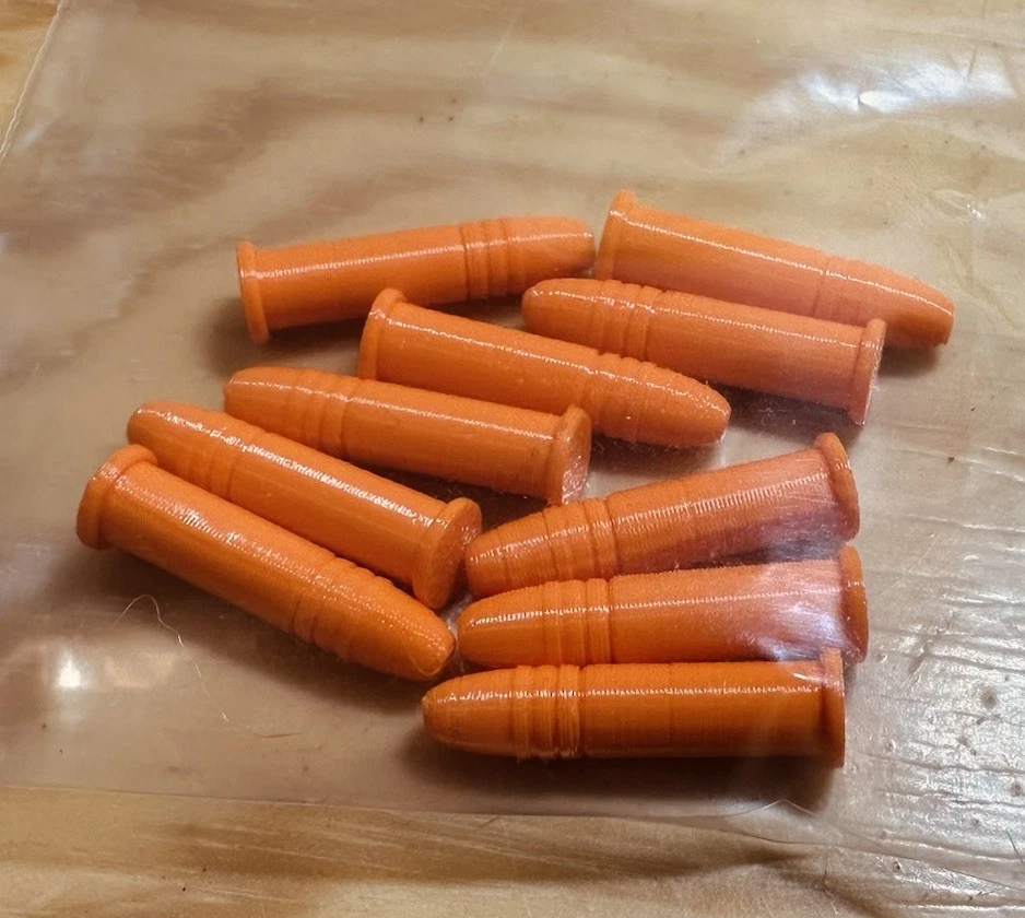 Paquete de 10 - LLANTA DE REVÓLVER CON TAPA A PRESIÓN 22LR con clasificación de fuego seco - TPU - Maniquí inerte redondo Foto 2 de 4