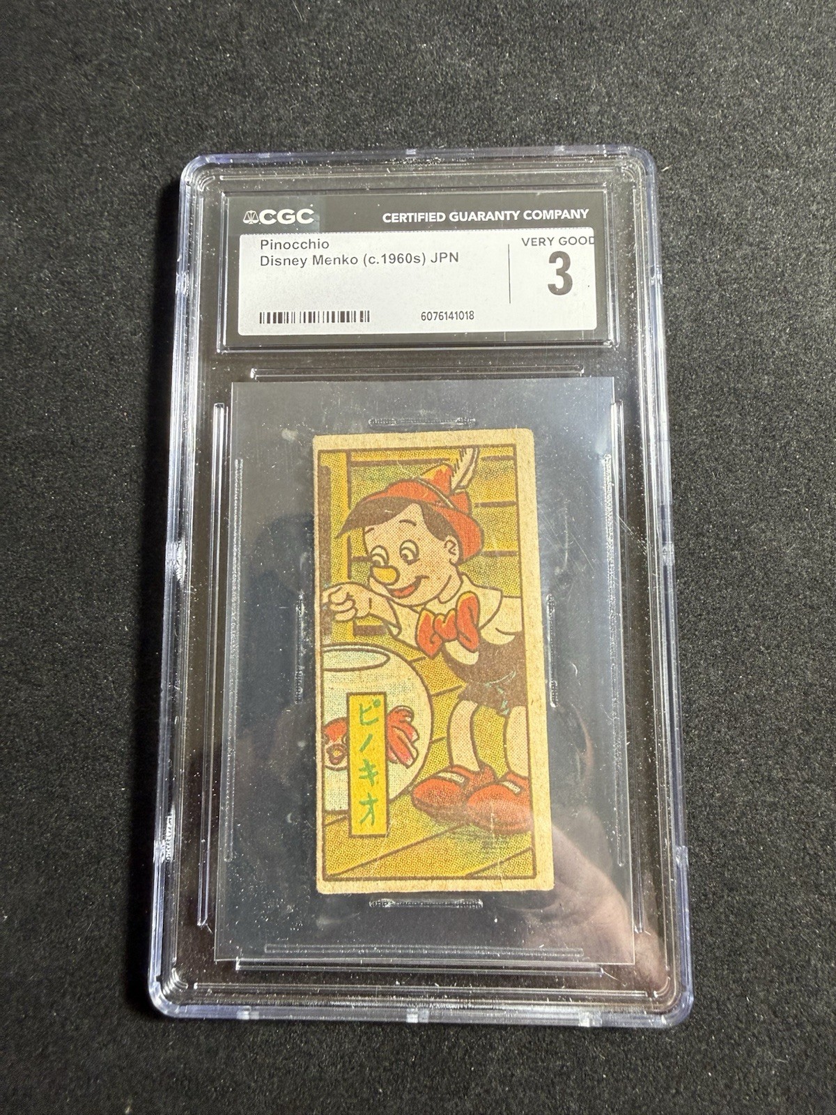 Japanese Menko Disney Pinocchio card Looking/catching A Fish  CGC 3