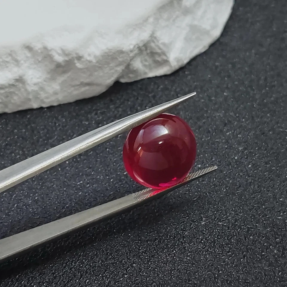 Lotes de rubíes cultivados en laboratorio al por mayor de 6x6 mm cabujón redondo piedras preciosas sueltas para joyería Foto 2 de 4