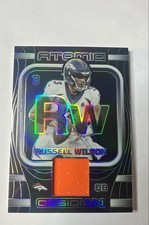 2023 Panini Obsidian - Atomic Materials Russell Wilson #AMA-RWI /199 (MEM)