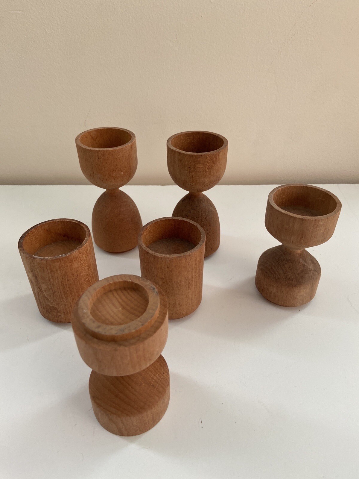Pair of designer stackable modular wood tea light candle holders. MCM vibe
