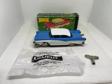 Schuco- Micro Racer 1045-ford custom 300-blue/white with replacement key-