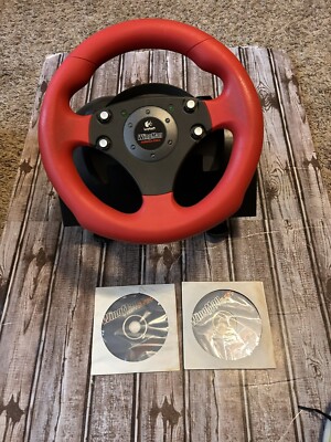 logitech wingman formula  steering while and peddles  wheel no cords