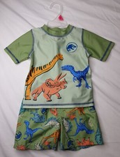 NEW, Boy s Universal City JURASSIC WORLD Green Swim Shorts Shirt Set 18M
