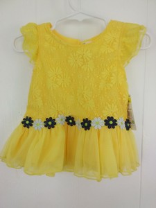 yellow flowery top