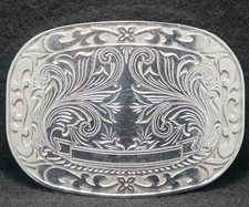 XA01110 VINTAGE 1970s FLORAL ARTWORK FASHION UNISEX SILVERTONE BELT BUCKLE