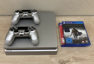 Sony Playstation 4 Slim in Silber, 500GB inkl. 2 Controller PS4 + Spiele