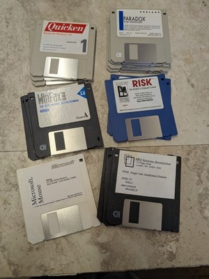 Vintage 3.5'' Floppy Disk Lot 54 in four paper boxes.  Some are commercial DOS