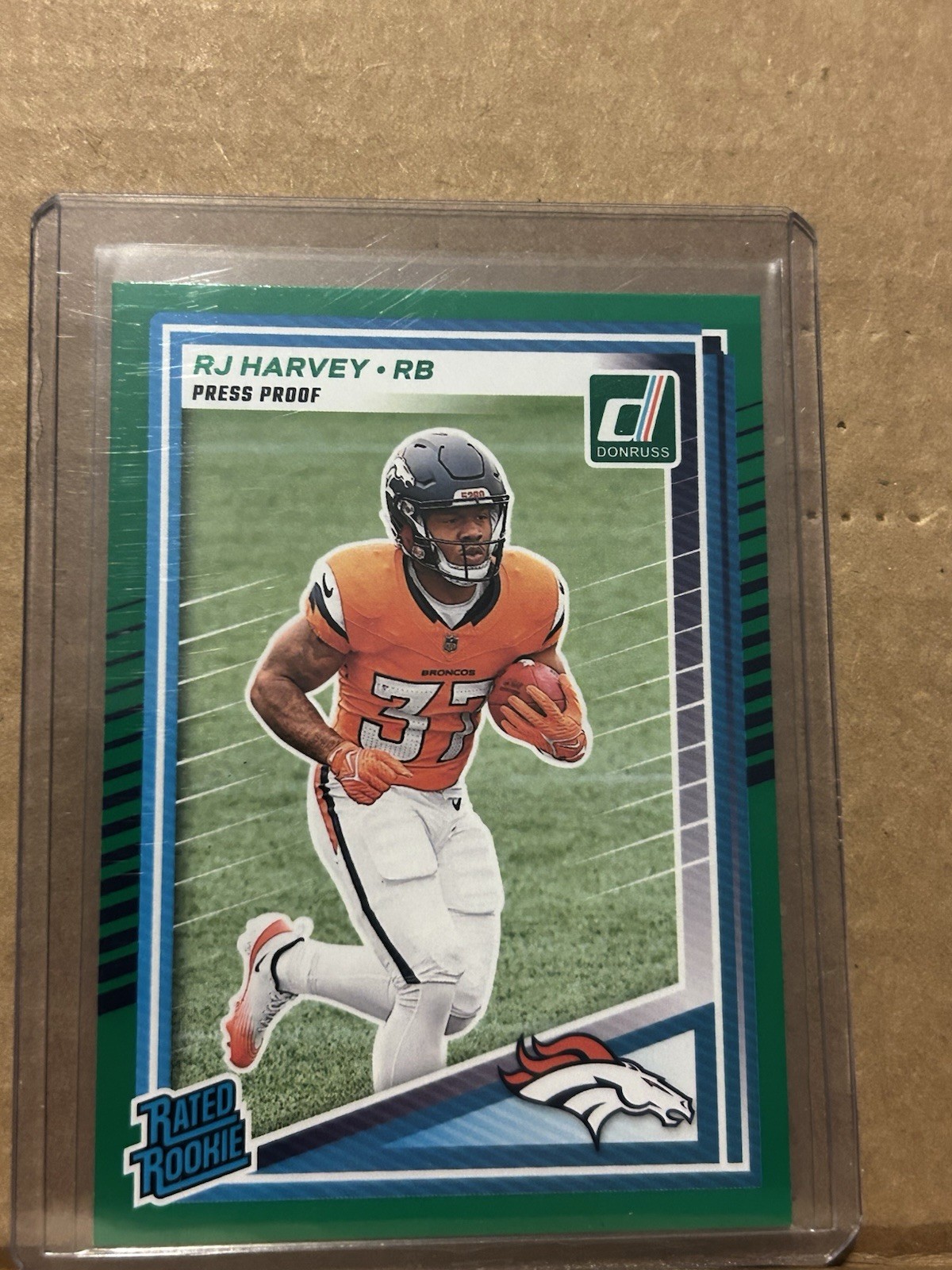 2025 Donruss Football RJ Harvey Green Press Proof Rated Rookie Broncos