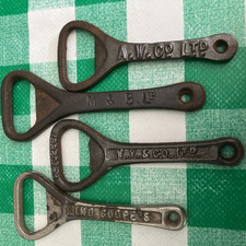 4 Vintage Cast Iron Bottle Openers