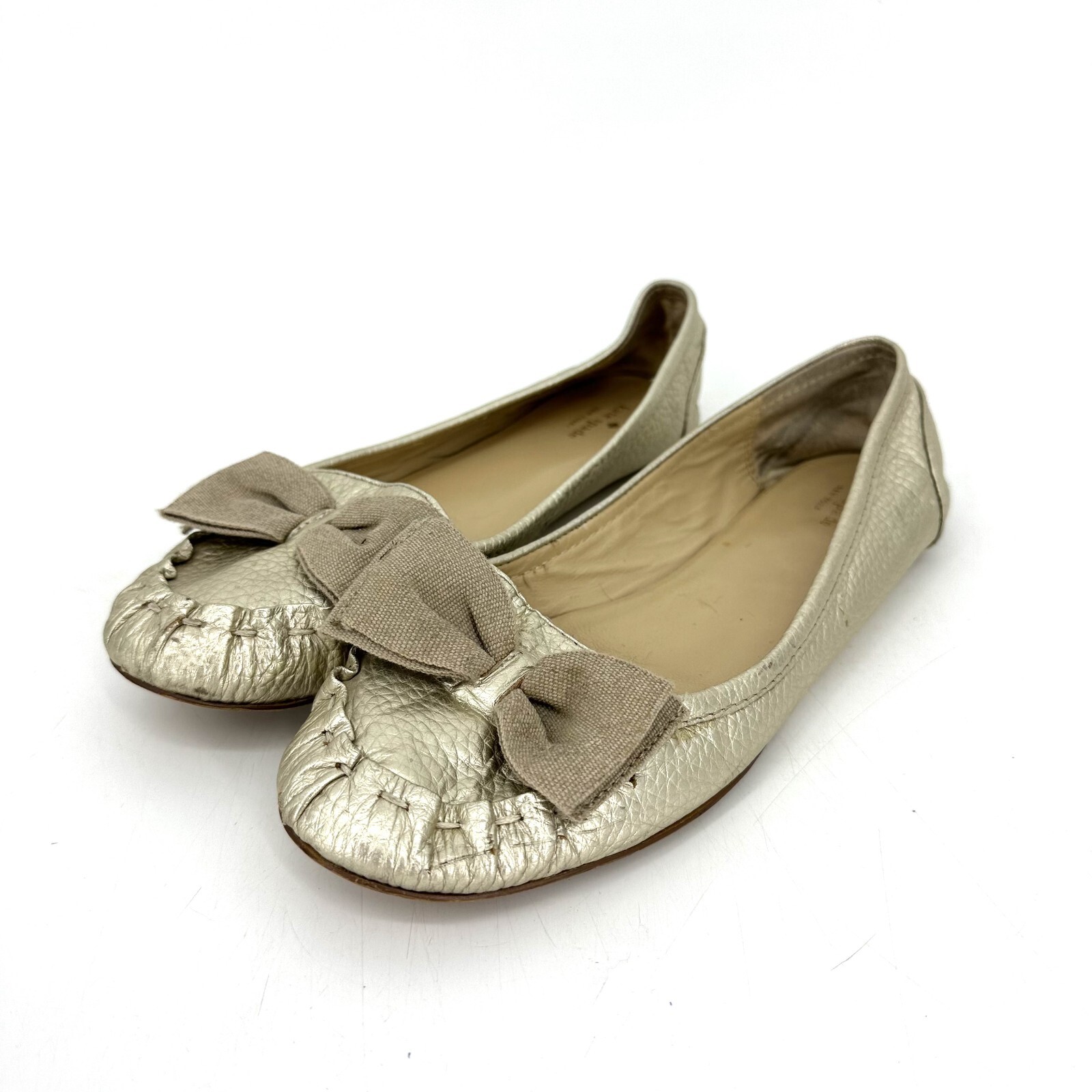 Kate Spade Champagne Gold Leather Moccasin Flats with… Gem