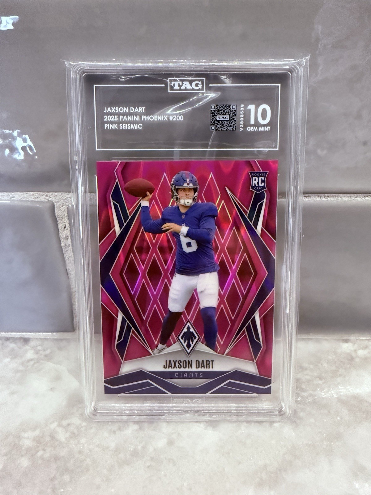 2025 Panini Phoenix - Rookies Jaxson Dart #200 Pink Seismic /75 (RC)