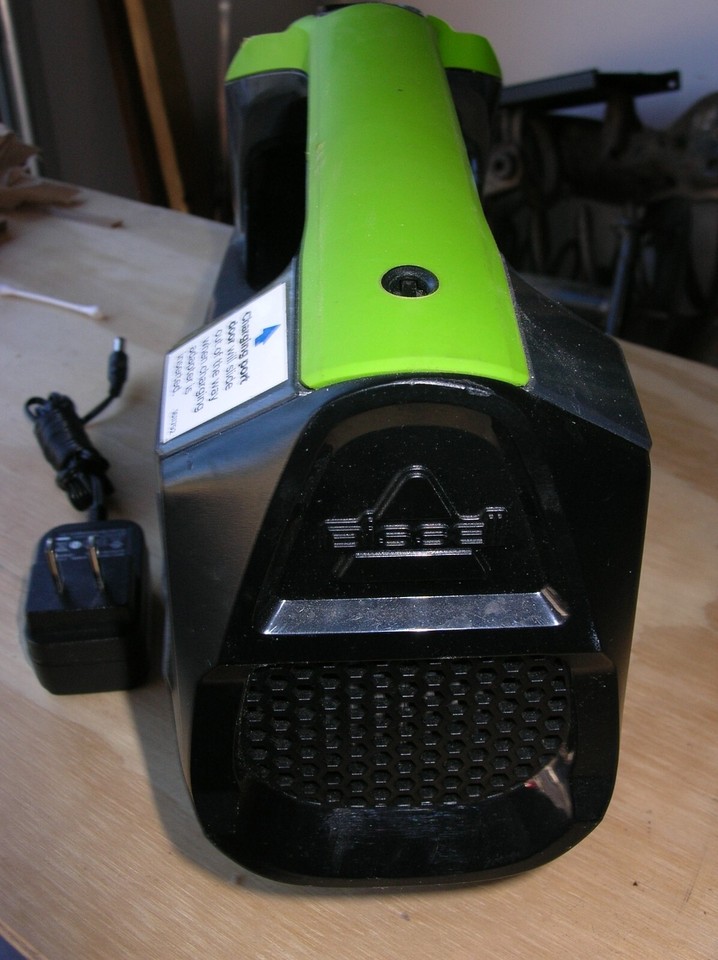 BISSELL 2003A Pet Stain Eraser Cordless Carpet Cleaner Green charger