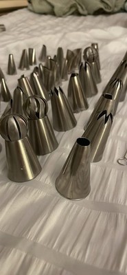 assorted baking piping tips for cupcakes, cakes. wilton, ateco, random