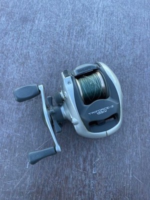 casting reel on a fly reel seat REC Aluminum ABS Model:8000 R which is known to Powermesh Spring Bank and Creek
