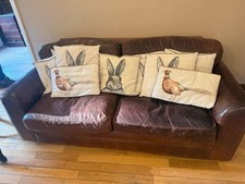 Brown leather sofa 3 seater. Well used but still in usable condition
