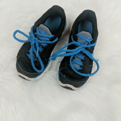 under armour black tennis shoes