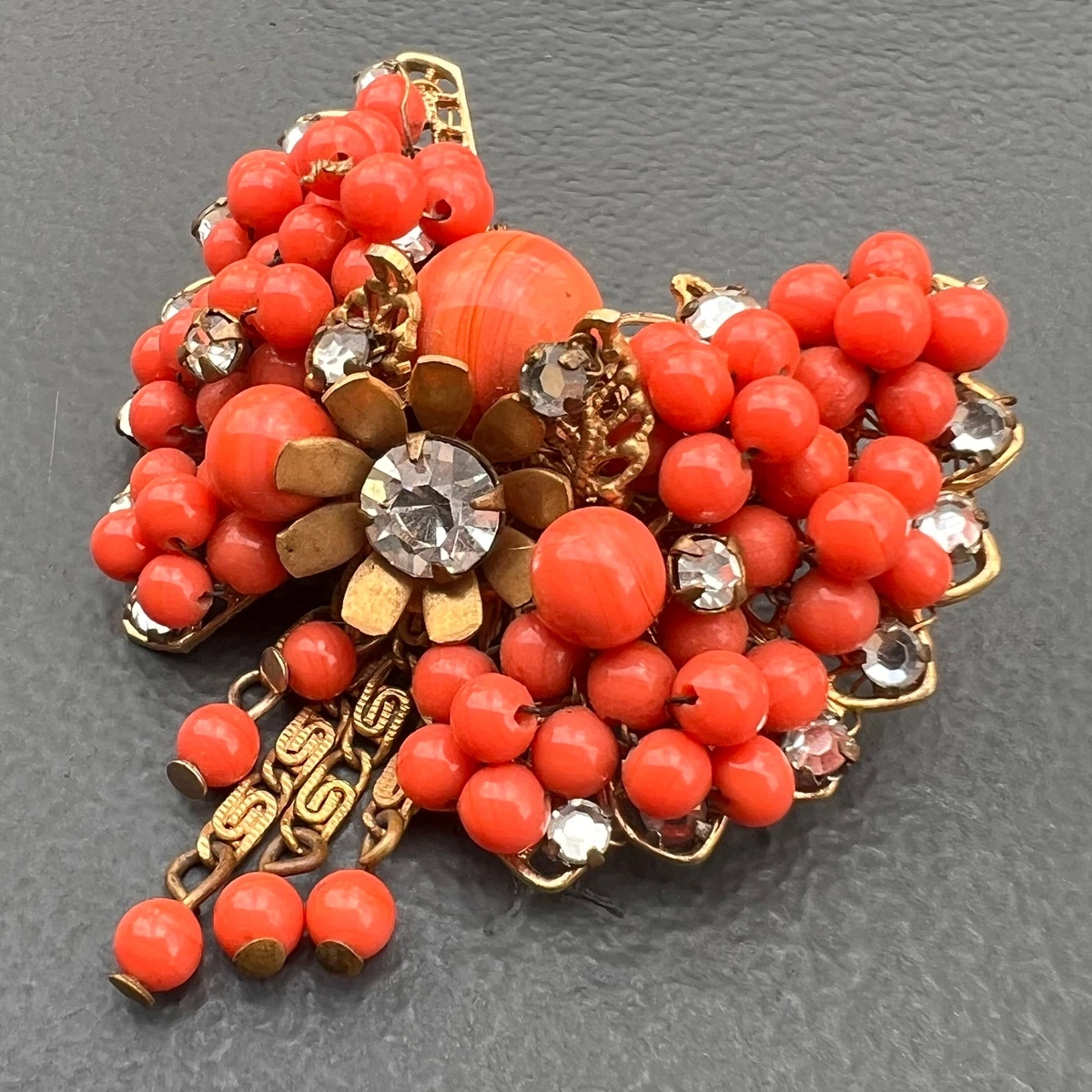 High store end brooches