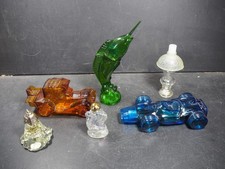 6 x Vintage Empty Avon Bottles Racing Car, Sword Fish ect