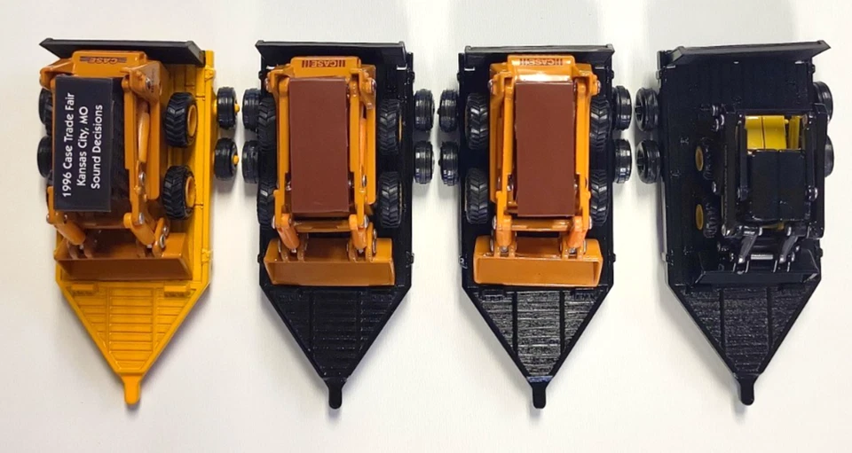 ERTL 1/64 Diecast Case 1845C - Lote de minicargadoras y remolque New Holland LX665 Foto 2 de 4