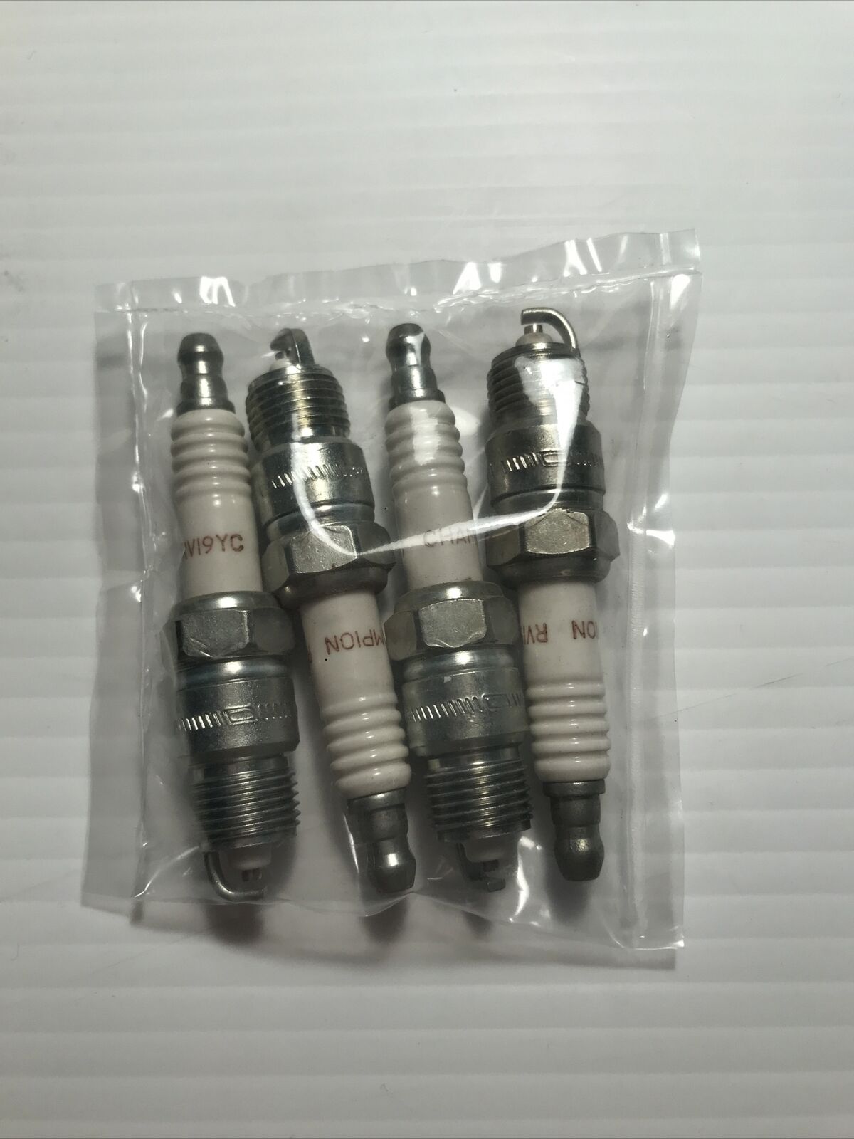 Champion Copper Plus Spark Plugs #RV19YC  4 Pack