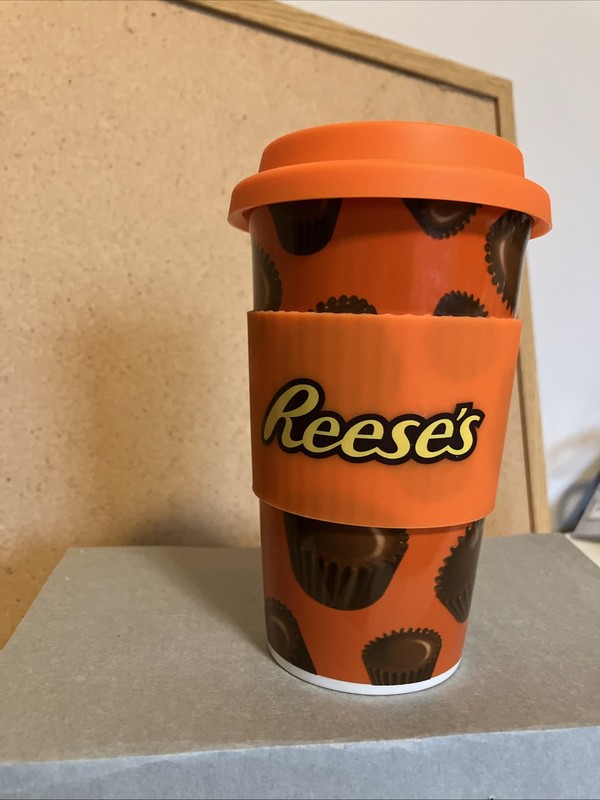 REESE’S Peanut Butter Cup CERAMIC TRAVEL MUG With Silicone Sleeve And Lid.