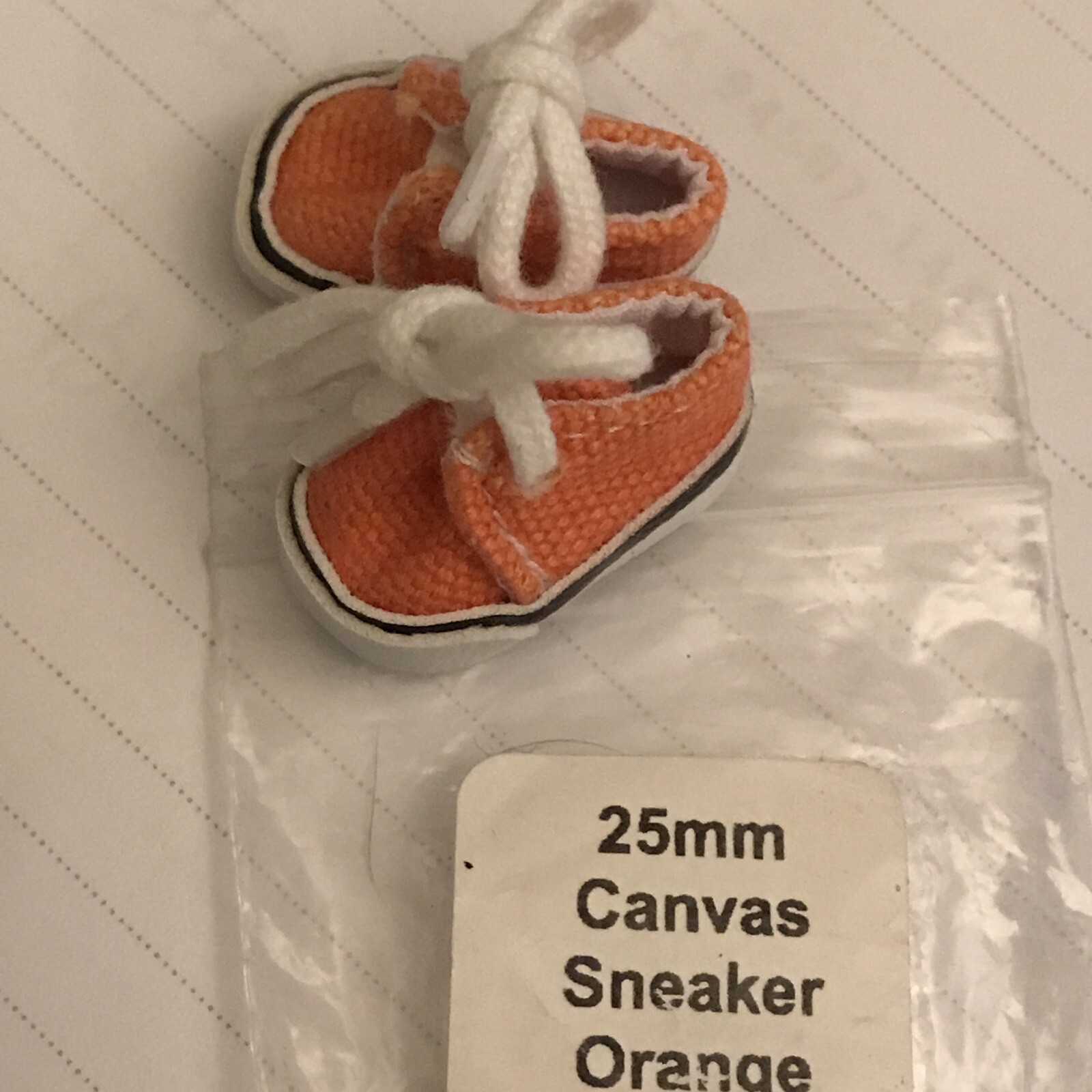 orange canvas sneakers