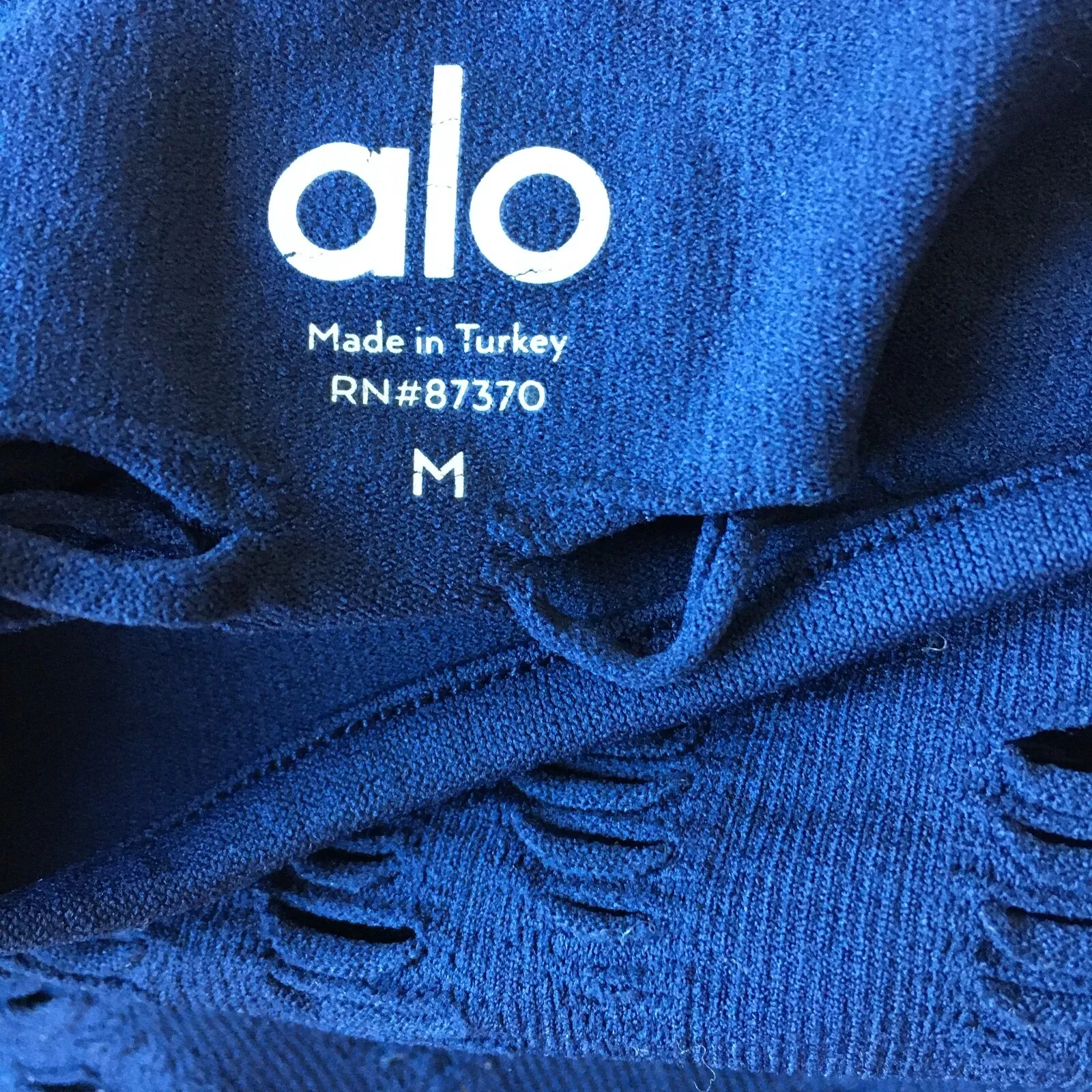 alo-yoga fitted perforated stretchy seamless wanderer shirt