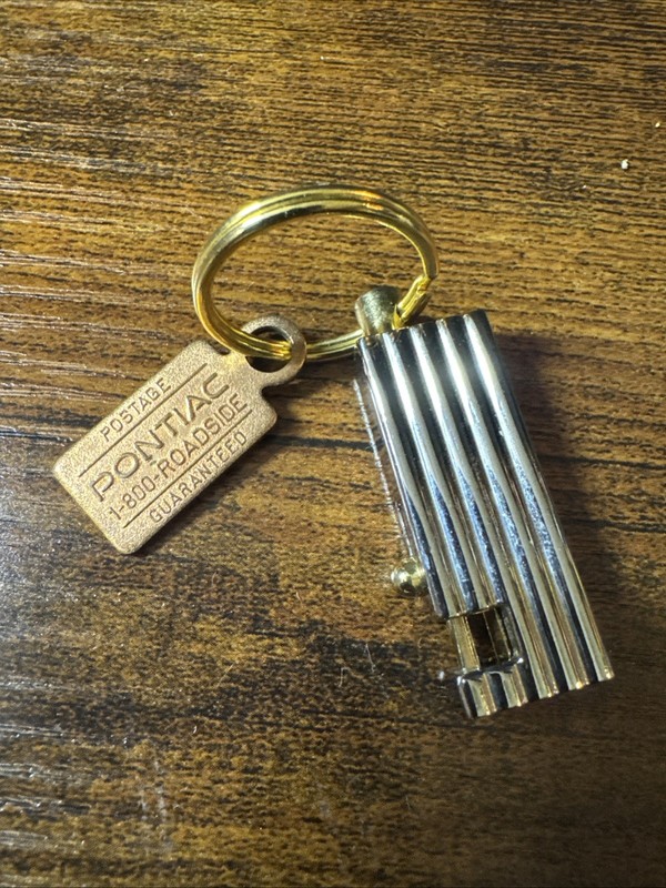 Vintage Pontiac Bonneville Key Ring with Push Button Release to remove Key
