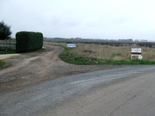 Photo 6x4 Road Bend Brandon Bank Bend and track to Temple Farm at the end c2017