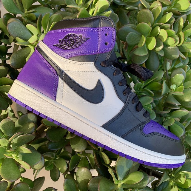 purple jordan 11 high